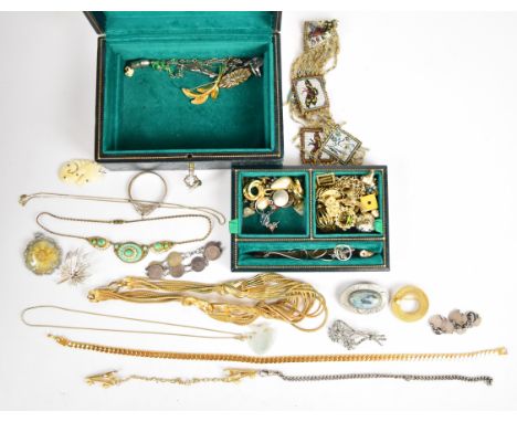 A collection of jewellery including three silver rings, silver cross and chain, Scottish silver brooch, charm bracelet, three
