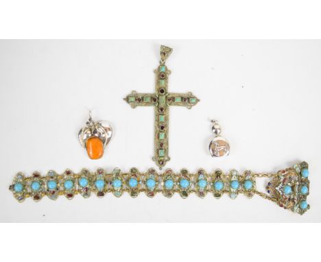 A filigree cross set with garnets and turquoise (28g), two silver pendants and a Czech belt