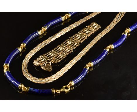 A lapis lazuli necklace made up of elongated sections with 9ct gold clasp and fittings (20.8g), a 9ct gold tri-coloured plait
