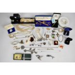 A collection of jewellery, some silver including two napkin rings, Celtic brooch, earrings,