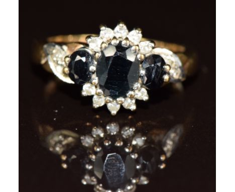 A 9ct gold ring set with sapphires and diamonds, 3.9g, size M