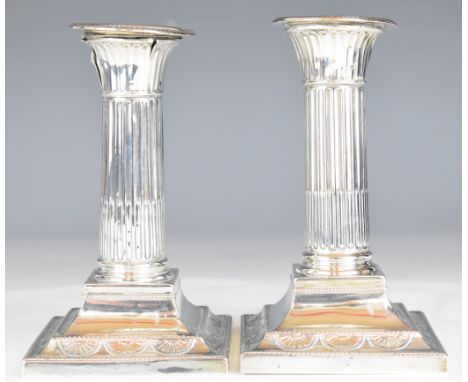Pair of Victorian hallmarked silver candlesticks with reeded columns and square bases, London 1898, maker&nbsp;William Hutton