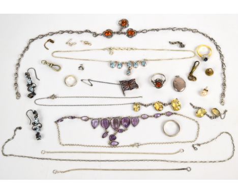 A collection of silver jewellery including Art Deco necklace (damaged), flag brooch, two rings, pressed amber necklace, neckl