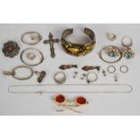 A collection of silver jewellery including six pairs of earrings, brooch, four rings, chain and
