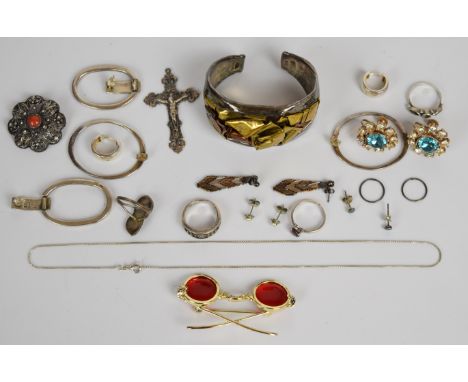 A collection of silver jewellery including six pairs of earrings, brooch, four rings, chain and crucifix, together with a Hol