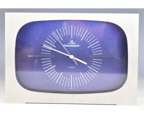 Jaeger LeCoultre 5052 electric retro mid century mantel or desk clock with brushed stainless steel case and black dial, width