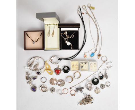 A collection of silver jewellery including Ola Gorie brooch, fifteen pairs of earrings, seven pendants, four chains, bangle, 