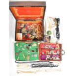 A collection of Victorian and Art Deco costume jewellery including paste brooches, Art Deco beads,
