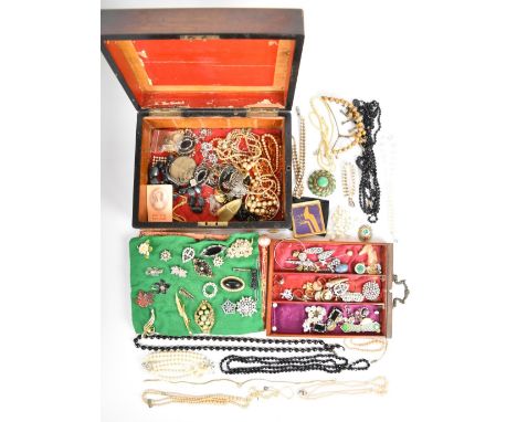 A collection of Victorian and Art Deco costume jewellery including paste brooches, Art Deco beads, necklace and buckle and 9c