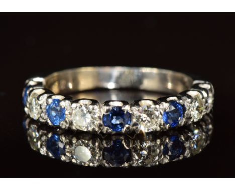 An 18ct gold half eternity ring set with sapphire and diamonds, each approximately 0.1ct, 4.4g, size N