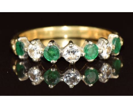 An 18ct gold ring set with emerald and diamonds, 3g, size P