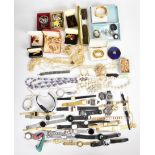 A collection of jewellery including Art Deco lorgnette, vintage brooches, silver brooch set with a