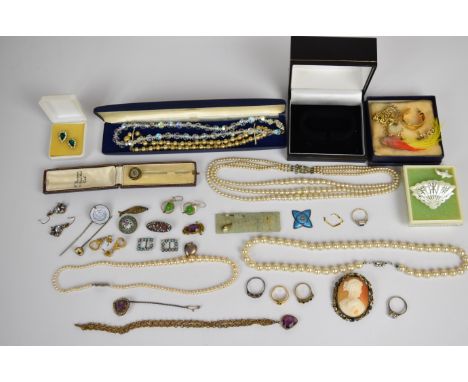 A collection of jewellery including silver earrings, cameo brooch, Japanese stick pin, silver heart shaped pendant set with e