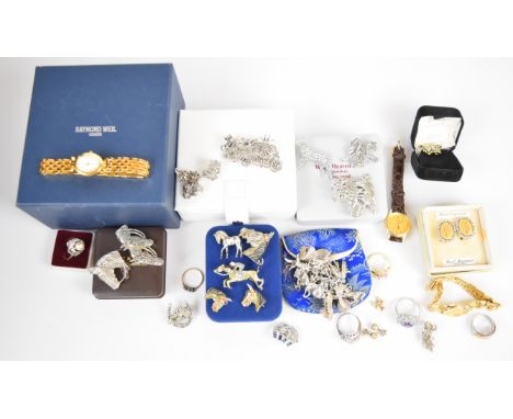 A collection of jewellery including silver charm bracelet, brooches including marcasite, Art Deco and enamel horse examples, 