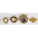 Victorian mourning brooch set with black enamel and hair and three other Victorian brooches