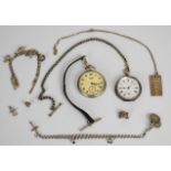 A collection of silver jewellery including charm bracelet, fob chain with charms, pocket watch,