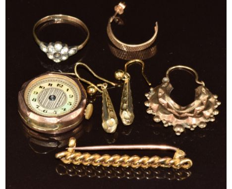 A 15ct gold curb link brooch (2.6g), a pair of 9ct gold earrings (1.1g), 9ct gold and silver ring, a 9ct gold cased watch and