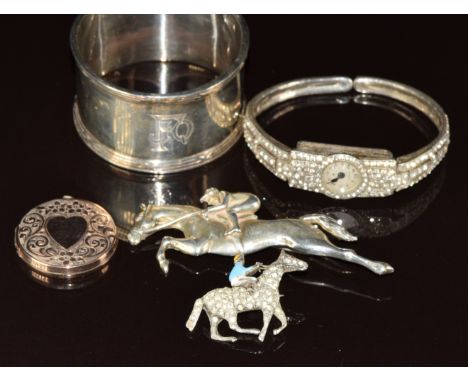 Hallmarked silver horse racing brooch, another silver horse racing brooch set with paste and enamel, silver cocktail watch se