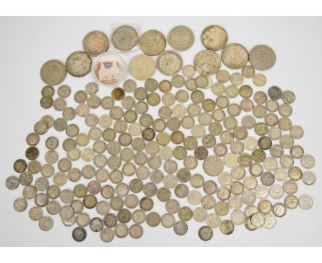 Approximately 465g of pre-1947 silver coinage, also includes some pre 1920 silver threepences, gradeable half crowns of Georg