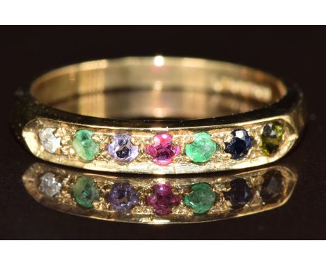 A 9ct gold ring set with a diamond, emerald, amethyst, ruby, emerald, sapphire and tourmaline spelling 'Dearest', 1.8g, size 