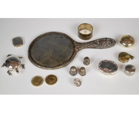 Hallmarked and other silver items to include hand mirror, napkin ring, four thimbles, button, four trinket or pill boxes, two