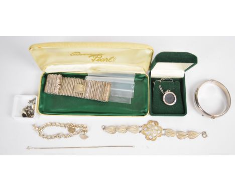 A collection of silver jewellery including Wedgwood pendant, bangle, charm bracelet, filigree bracelet, etc, 153g&nbsp;