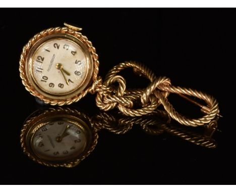 Jaeger LeCoultre 9ct gold nurse's watch with gold hands and hour markers, silver dial and signed movement, on 9ct gold bow br