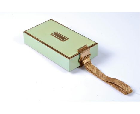 A mid 20th century minaudière by Park Lane, in pale green and gilt metal, with mirror, powder, rouge and lipstick compartment