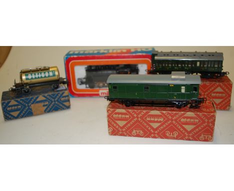 A boxed Marklin H0 locomotive together with three boxed Marklins wagons (4)