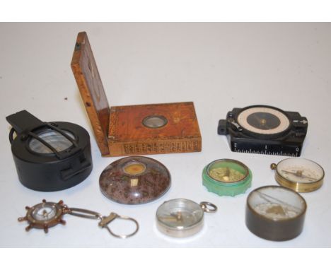 A military style prismatic compass; together with various other pocket compasses 