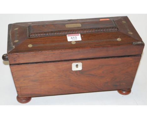A Victorian rosewood and mother of pearl inlaid fitted tea caddy