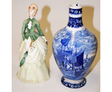 A Wedgwood blue and white transfer decorated decanter, manufactured for Humphrey Taylor & Co of London, distillers of famous 