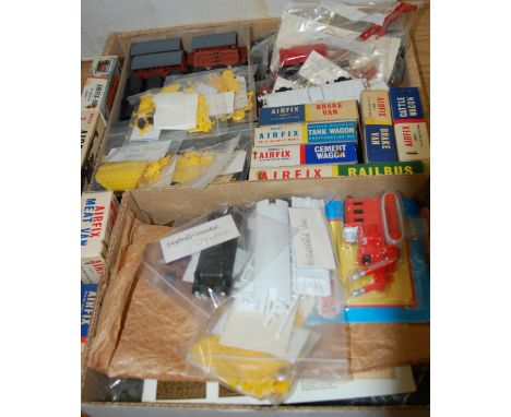 Two boxes containing a large quantity of plastic kit, plastic 00 scale railway kits and accessories to include Airfix meat va