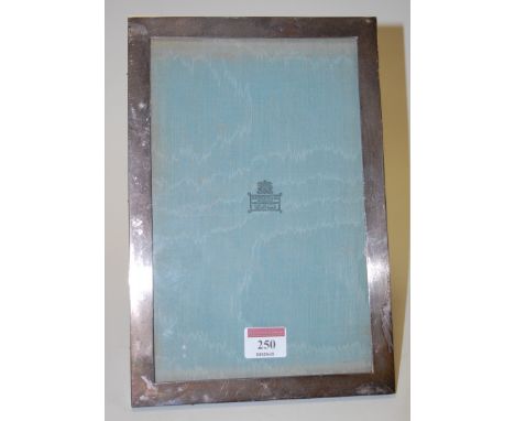 A Hamilton & Co. of Calcutta silver mounted easel photograph frame, undecorated, 29x19cm