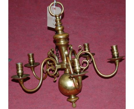 A Dutch style brass five light ceiling pendant and one other similar; together with a cast gilt metal example (3)