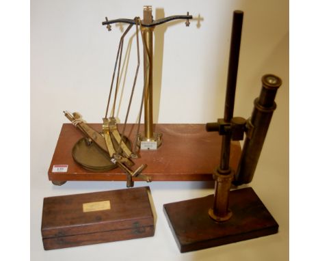 A Victorian rosewood cased Sykes hydrometer; together with an early 20th century part monocular microscope and a set of brass