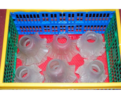 A collection of assorted frosted frilled glass ceiling light shades