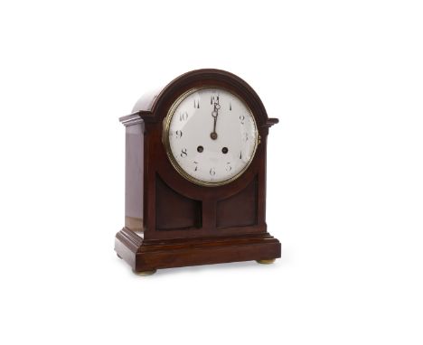 EDWARDIAN MANTEL CLOCK
the arched case enclosing a circular white enamel dial with Arabic numerals and 8 day movement, signed