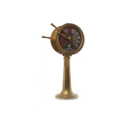 MINIATURE BRASS SHIP'S TELEGRAPH
with black glass indicator dials, fitted with electric light, 50cm high 