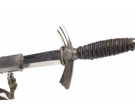 GERMAN WWII FIRST MODEL LUFTWAFFE DAGGER
with straight double edged blade, the cross guard marked with a curved swastika, lea