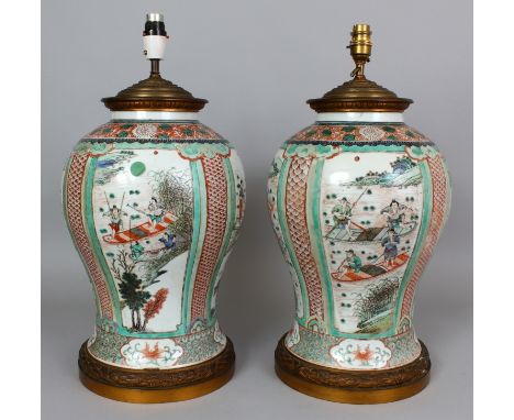 A GOOD LARGE PAIR OF CHINESE KANGXI PERIOD FAMILLE VERTE PORCELAIN VASES, fitted for electricity with gilt metal stands and f