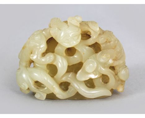 A 17TH CENTURY CHINESE LATE MING DYNASTY CELADON JADE HAT FINIAL, pierced and carved in relief with sinuous chilong and lingz