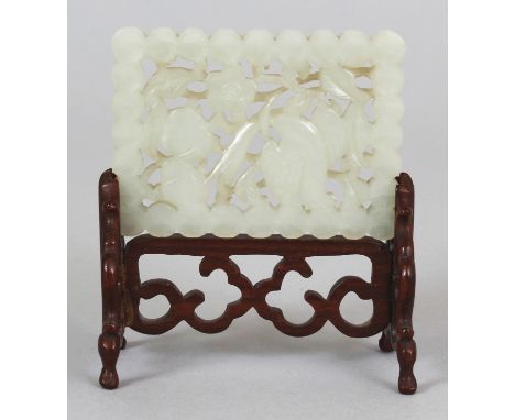 AN EARLY/MID 20TH CENTURY CHINESE PIERCED RECTANGULAR WHITE JADE PLAQUE, together with a fitted wood stand, the jade carved w