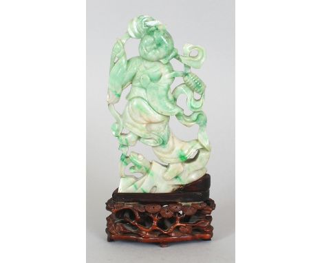A 19TH/20TH CENTURY CHINESE APPLE-GREEN JADE FIGURE OF LIU HAI, together with a good quality fixed hardwood stand carved with