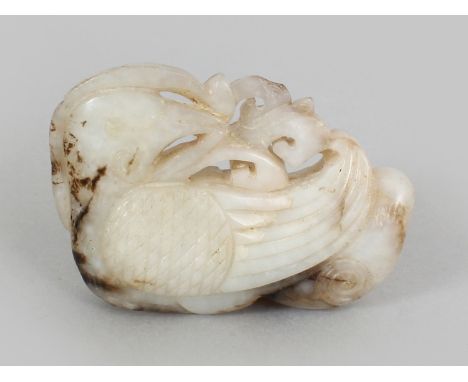 A CHINESE JADE CARVING OF A DUCK, clasping a frond of lingzhi in its beak, the stone of predominantly white hue with russet a