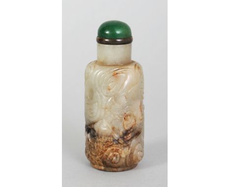 AN 18TH CENTURY CHINESE JADE SNUFF BOTTLE, with stopper, the bottle well carved with a chilong amidst cloud scrolls, the grey