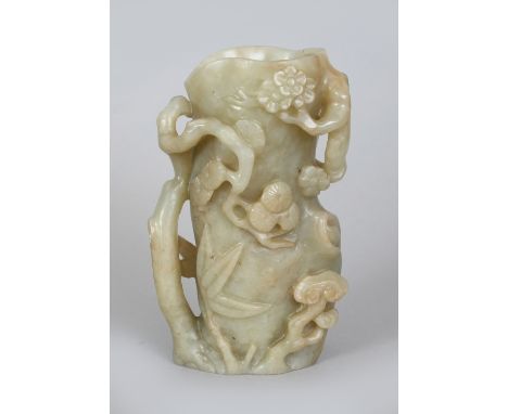 A GOOD 17TH/18TH CENTURY CHINESE CELADON JADE TREE BOLE VASE, the sides carved in high and pierced relief with pine, plum blo