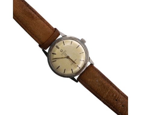 the circular champagne dial with baton numerals and outer minute markers, 35mm dia., on later brown leather strap. With red l
