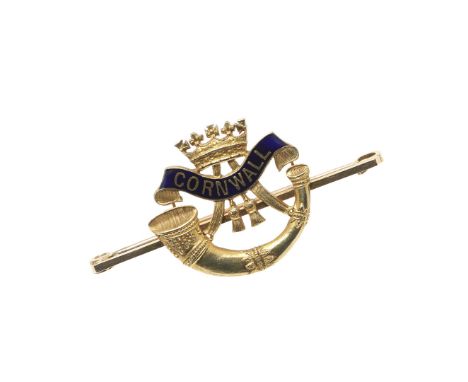 formed with a bugle strung from a Ducal Crown, on a 'Cornwall' scroll inlaid with blue enamel, signed with maker's initials t