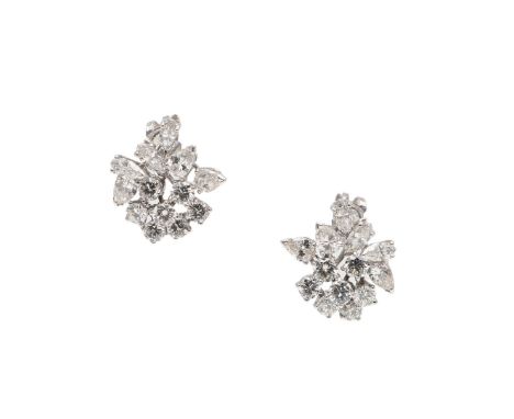 each earring set with briliant-cut, marquise-cut and pear-shaped diamonds, in white gold, 2cm long, 8.6 grams. In blue leathe